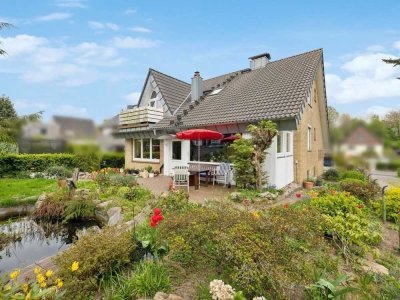 Gepflegt. Großzügig. Gut gelegen. Einfamilienhaus mit vermieteter Einliegerwohnung in Kiel-Suchsdorf