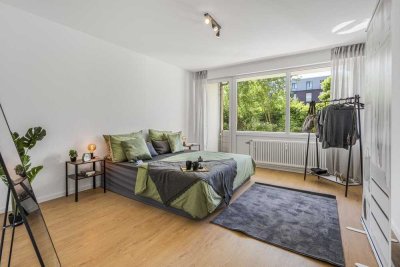 Bezugsfertig modernisiert: 2-Zimmer mit Balkon ins Grüne - Wärmepumpe, Aufzug, Garage