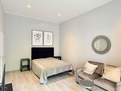 Saniert und vollständig möbliert: hochwertig ausgestattete 1,5-Zimmer-Wohnung