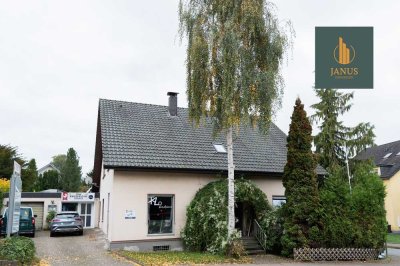 Zweifamilienhaus mit Gewerbeeinheit und vielseitigen Nutzungschancen