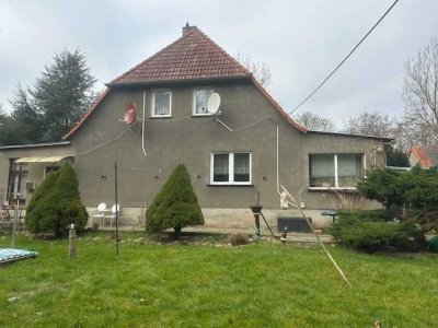 Ehemaliges Bauerngehöft mit großem Grundstück auf der Insel Rügen, mit viel Nebengelass in ruhiger L
