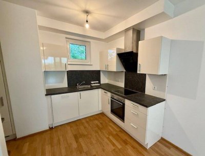 Traumhafte Gartenwohnung mit eigenem Tiefgaragenplaz