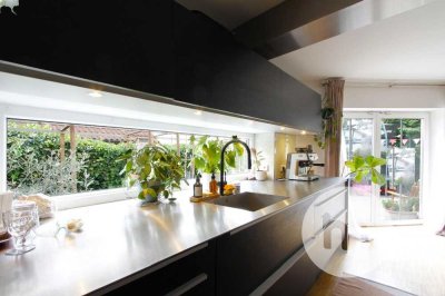 3-Zimmer-Maisonettewohnung mit stilvoller Küche und großem Traumgarten