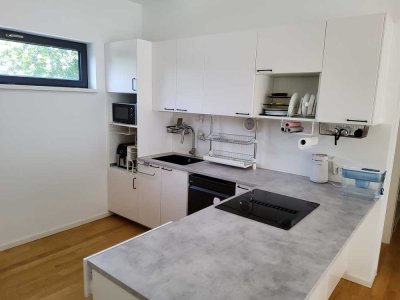 Heller 4-Zimmer-Neubau mit Südterrasse: Stilvolles Design trifft auf behagliche Fußbodenheizung.