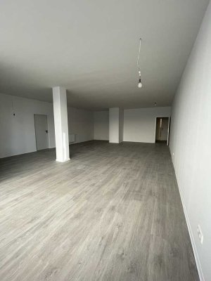 Erstbezug: Weitläufiges 1-Zimmer-Loft in zentraler Lage