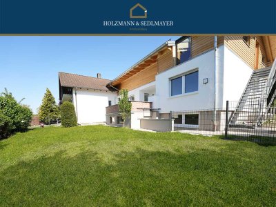 Haus im Haus: 
4,5-Zimmer-Wohnung über 2 Etagen mit Terrasse in Adlkofen
