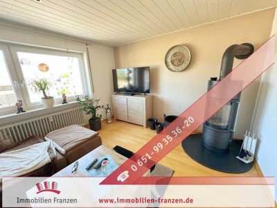 Trier-West: Traumhafte 4-ZKB Wohnung mit drei Balkonen, Kamin, Gartenmitbenutzung und atemberaubende