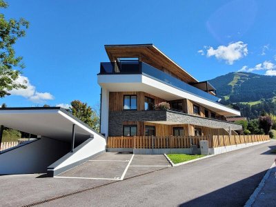 Exklusive Gartenwohnung in ruhiger Sonnenlage mit herrlichem Natur- und Bergpanorama
