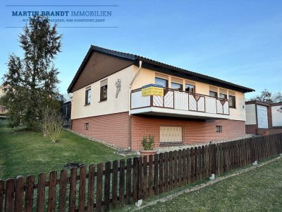Freistehendes Einfamilienhaus mit Wintergarten 
und kleiner Halle in Feldrandlage in Holzhausen...