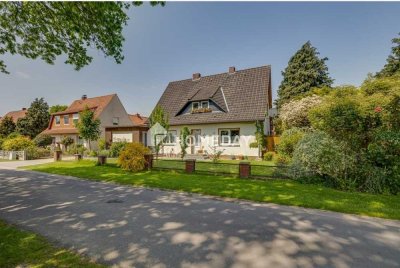 Modern saniertes Traumhaus mit Garten, Teich und Doppelgarage – ideal für Familien