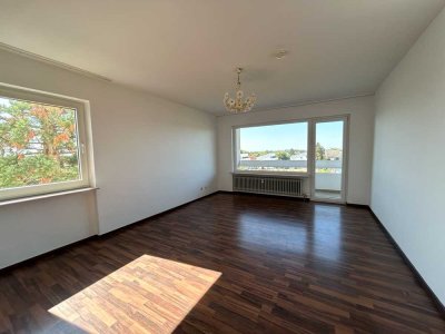 Wohnen im Grünen: Lichtdurchflutete 3-Zimmer-Oase mit Balkon