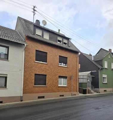 Mehrfamilienhaus mit 4 Wohneinheiten, Garten & Garage – Renditeobjekt