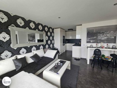 Charmante, vollrenovierte 4-Zimmer-DG-Wohnung mit 2 Terrassen und Fernblick!