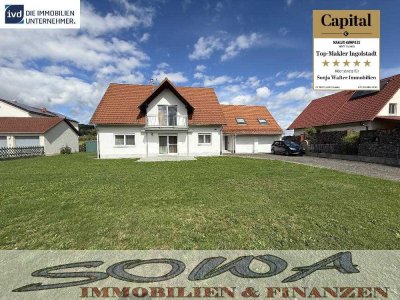 Einzugsbereites Zweifamilienhaus mit Keller, Doppelgarage und Wärmepumpe - Ein Objekt von SOWA Im...