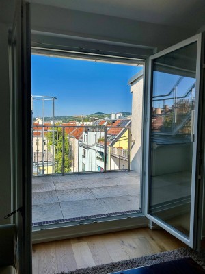 Helle Dachgeschoßwohnung- Maisonettenwohnung