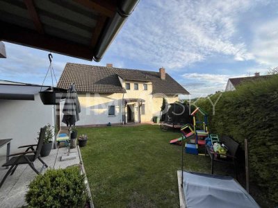Exklusive Dachwohnung mit Garten und Blockhaus in Toplage