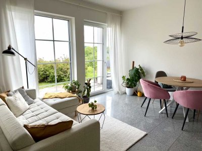 Schöne 2-Zimmer Erdgeschosswohnung mit Terrasse und Blick ins Grüne möbliert zur Zwischenmiete.