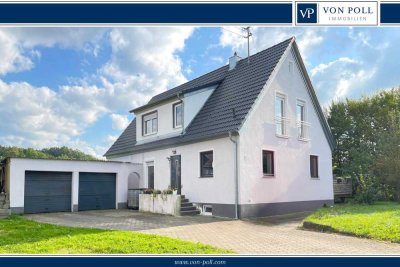 Bezugsfertiges Einfamilienhaus mit großzügigem Grundstück und Doppelgarage in Ortsrandlage