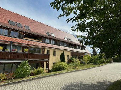 Kapitalanlage – Vermietete 4 Raum Wohnung im 1.OG mit Balkon, EBK sowie Garage in Dresden Oberwartha