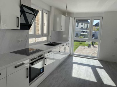 Moderne 4-Zimmer-Wohnung mit Garten, Garage und zusätzlicher Einliegerwohnung