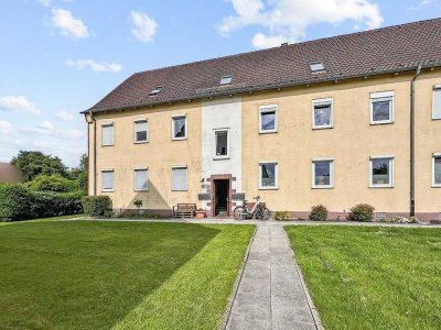 Top sanierte 3,5 Zimmer-Wohnung mit traumhaften Gartenanteil und Garage in Sande-Neufeld II