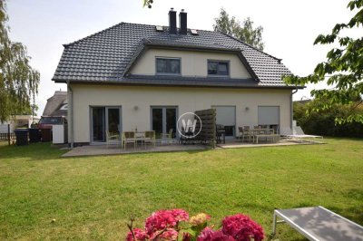 Edel Wohnen nahe Putbus - Moderne Haushälfte mit Wärmepumpe, Kamin und Luxusausstattung!