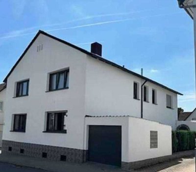 Attraktives Mehrfamilienhaus mit Pool in einer ruhigen zentralen Lage von Friedrichsdorf.