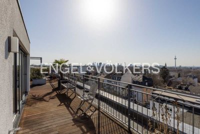 Lichtdurchflutete Maisonettewohnung mit großzügiger Dachterrasse und einzigartigem Skylineblick
