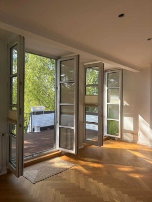 Geschmackvolle 2-Raum-Loft-Wohnung mit lux. Innenausstattung mit Terasse