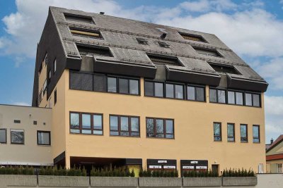 Moderne 2,5 Zimmer-Wohnung in zentraler Lage und großzügiger Dachterrasse