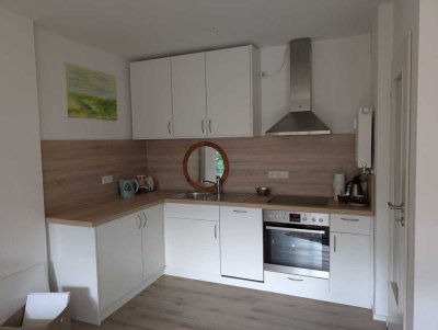 Appartement mit Balkon.