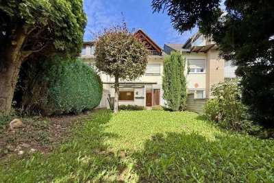 Stadtnah wohnen, im Grünen leben! Familienfreundliches Reihen-Mittelhaus mit viel Platz