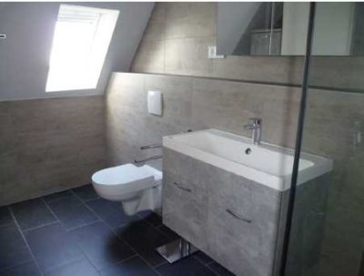 Einfamlilienhaus mit Garage, Einliegerwohnung und zwei separaten Terrassen in zentraler Lage