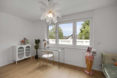 Familienidyll im Neubau: Großzügiges Mietshaus mit Garten