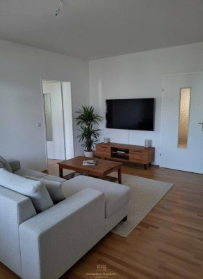 Wohnen im Grünen – Lichtdurchflutete Eigentumswohnung mit großem Balkon und Tiefgaragenplatz