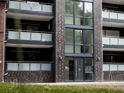 Neuwertig, modern und sehr zentral: Erdgeschoss-Eigentumswohnung mit Balkon und Stellplatz