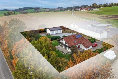 Wohnen und Arbeiten vereint: Zweifamilienhaus mit Lagerhalle auf großzügigem Gewerbegrundstück!