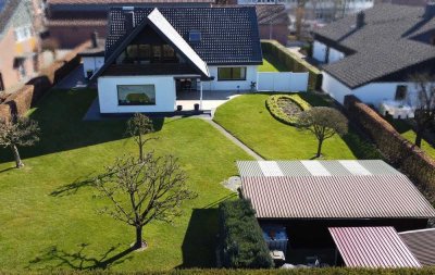 Sehr gepflegtes und vielseitiges Wohnhaus mit traumhaftem Garten zu verkaufen
