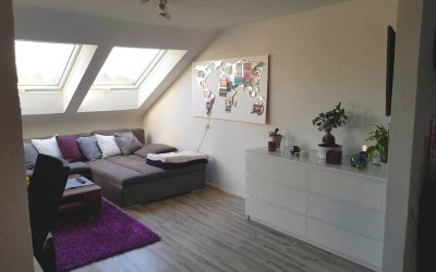 Traumhafte Dachgeschosswohnung mit sonniger Loggia – ein echtes Juwel hinter klassischer Fassade!