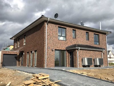 Doppelhaushälfte mit EBK und Garage im begehrten Neubaugebiet von WF!