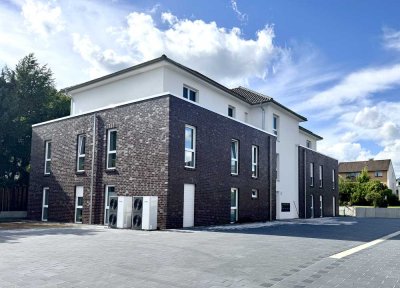 Geschmackvolle Erdgeschosswohnung ( drei Zimmer) mit Terrasse in Weddel – Neubau