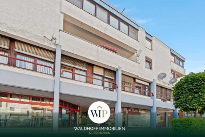 Kombipaket: Modernisiertes Ladengeschäft, eine sanierte UG-Einheit und zwei TG-Stellplätze