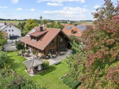 Nachhaltig wohnen: Vermietetes Vollholzhaus in familienfreundlicher Lage im Landkreis Erding