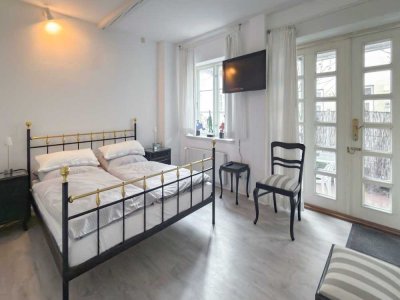 Zentrale 2-Zimmer-Wohnung mit Terrasse in ruhigem Zweifamilienhaus