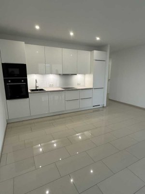 Neubau-Erstbezug! Hochwertige 2-Zimmer-Wohnung mit EBK & TG-Stellplatz