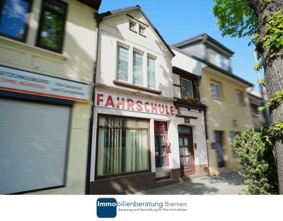 Wohn- und Geschäftshaus mit Garten