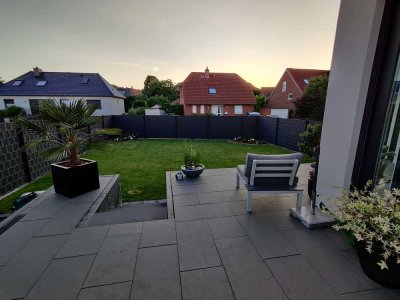 Hochwertige 3-Zimmer-Terrassenwohnung mit großem Garten in Luthe