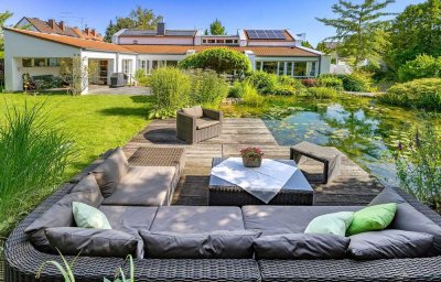 +++ Repräsentatives Refugium mit Einliegerwohnung und Pool +++ 1.500 m² Grundstück +++