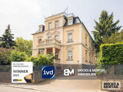 Stilvolle Wohnung in denkmalgeschützter Villa mit Kamin