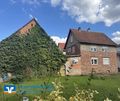Charmantes Einfamilienhaus mit Garten und Nebengebäuden in ruhiger Lage